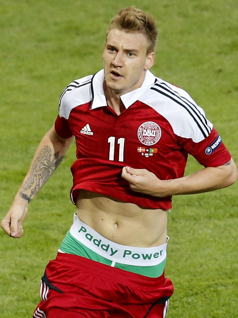 Caught with his pants down: Denmark's Niklas Bendtner was fined £80,000 and
banned for one game after this blatant stunt at the Euro 2012 finals