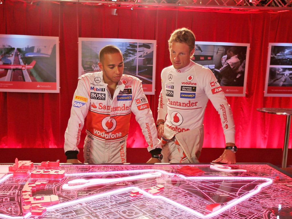 Lewis Hamilton and Jenson Button look at plans to race around
the streets of London