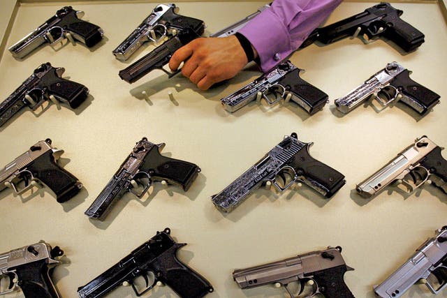 Guns for sale at a trade fair in Nuremberg, Germany, with 1,050
exhibitors from 51 countries