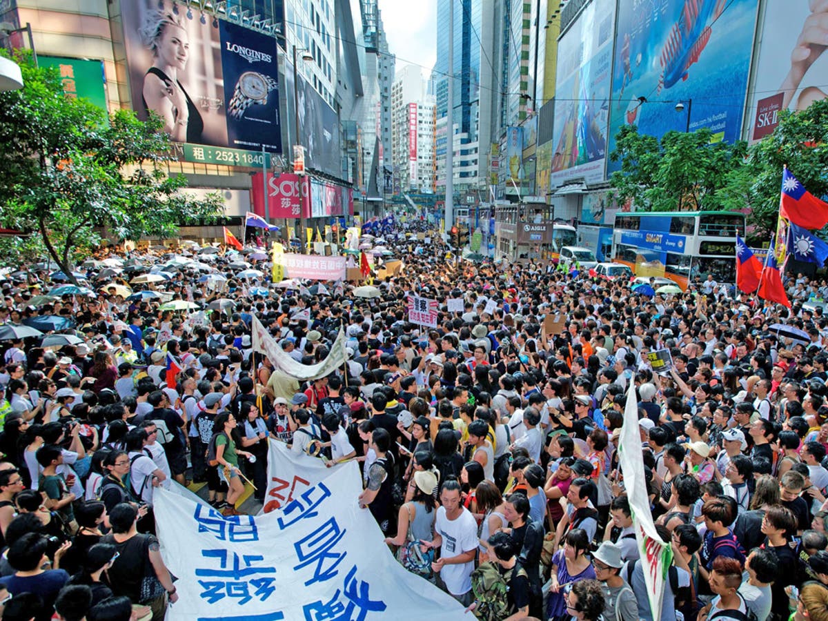 Mass protests in Hong Kong over China's 15-year rule | The Independent ...
