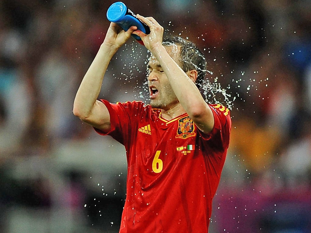 The brilliant Andres Iniesta cools off against Italy last night