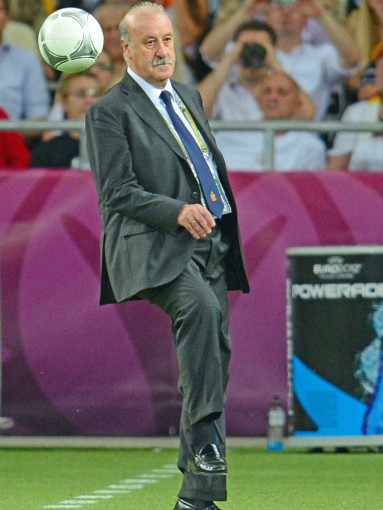 Spain coach Vicente Del Bosque misses his kick last night