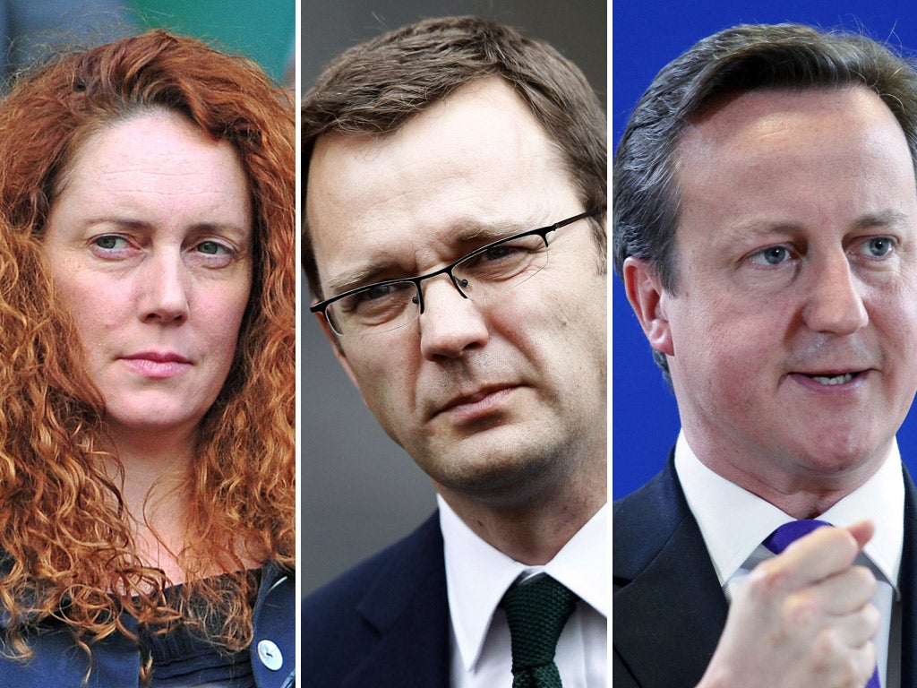 Somewhere in a field in Oxfordshire: (clockwise from left) Rebekah Brooks, Andy Coulson and David Cameron