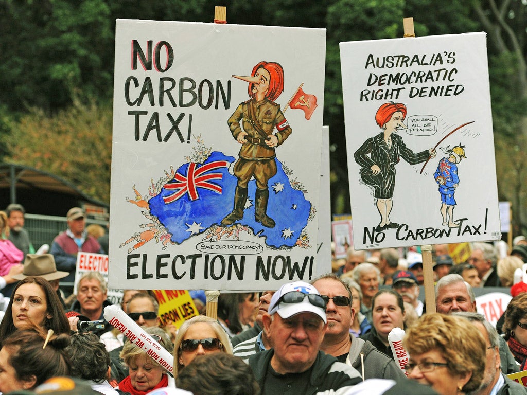 Two-thirds of Australians oppose the carbon tax, a poll says
