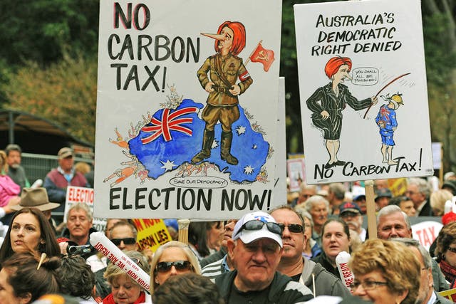 Two-thirds of Australians oppose the carbon tax, a poll says