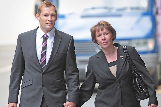 PC Simon Harwood in court with his wife Helen