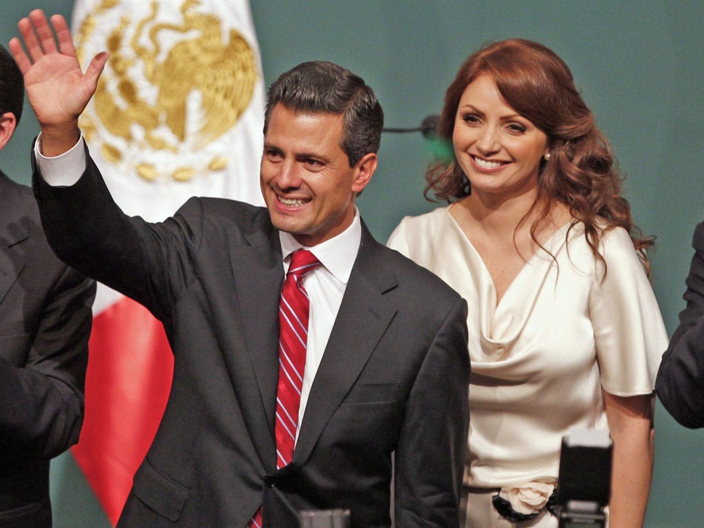 Enrique Peña Nieto celebrates with his wife Angelica Rivera