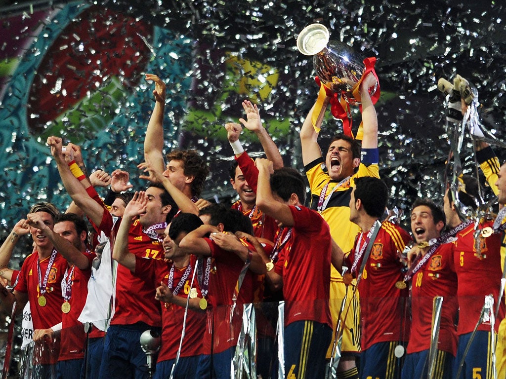 Spain captain Iker Casillas lifts the Euro 2012 trophy