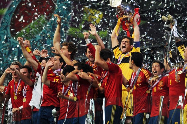 Spain captain Iker Casillas lifts the Euro 2012 trophy