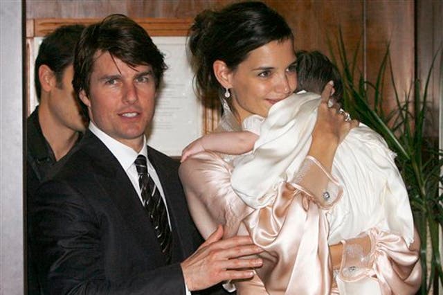 Katie Holmes with Tom Cruise and their daughter Suri in 2006
