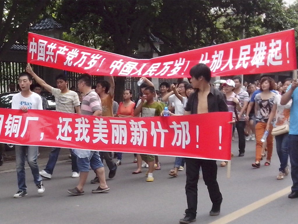 Shifang residents march against the proposed plant