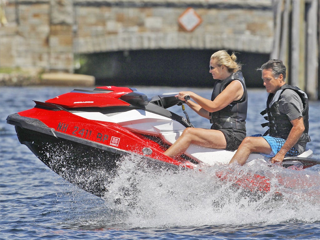 Mitt Romney and his wife, Ann, on a jet ski at Lake Winnipesaukee in New Hampshire