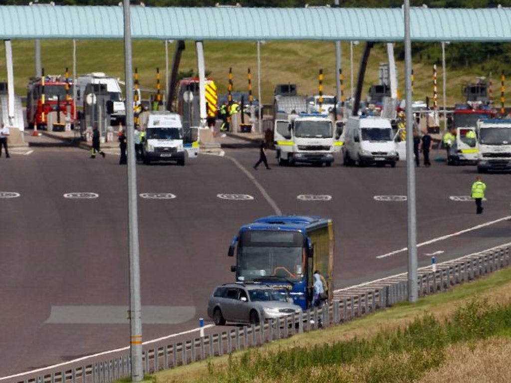 Army bomb disposal staff work on the Megabus coach
