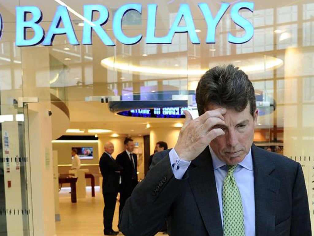 Barclays PLC President Bob Diamond waits to pose for photographs after being named as the company's next chief executive officer at a bank branch near their Canary Wharf headquarters in London in a September 7, 2010 file photo. Barclays Plc said its Chief Executive Bob Diamond had quit with immediate effect following a market-rigging scandal. Outgoing chairman Marcus Agius, who announced his resignation on Monday, will become full-time chairman and lead the search for a new chief executive. REUTERS/Dylan Martinez/files