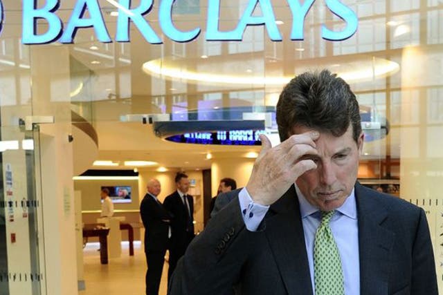 Barclays PLC President Bob Diamond waits to pose for photographs after being named as the company's next chief executive officer at a bank branch near their Canary Wharf headquarters in London in a September 7, 2010 file photo. Barclays Plc said its Chief Executive Bob Diamond had quit with immediate effect following a market-rigging scandal. Outgoing chairman Marcus Agius, who announced his resignation on Monday, will become full-time chairman and lead the search for a new chief executive.    REUTERS/Dylan Martinez/files   