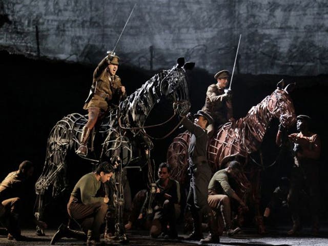 FILE - In this file theater publicity image provided by Lincoln Center Theater, a scene is shown from the production of "War Horse," performing at the Lincoln Center Theater in New York. "War Horse" was the No. 2 movie in 2011.