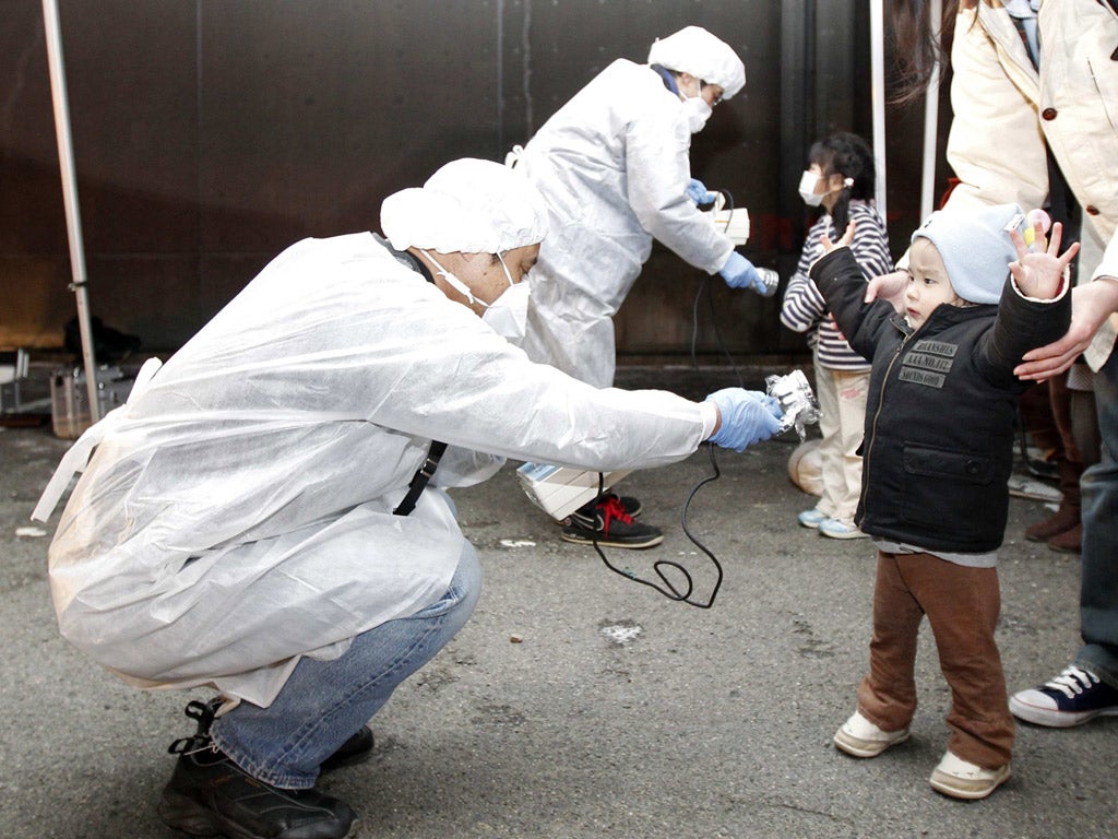 Checking for radiation near the Fukushima
plant two days after the tsunami struck