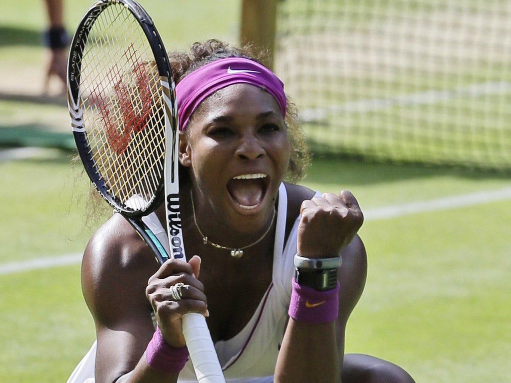 Serena Williams
celebrates her 6-3, 7-6
semi-final win over
Victoria Azarenka