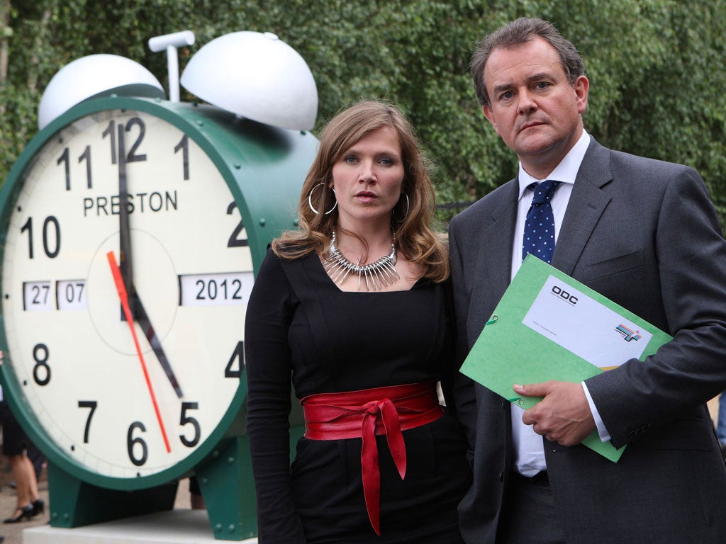 Hugh Bonneville with Jessica Hynes by the 'Twenty Twelve' countdown clock