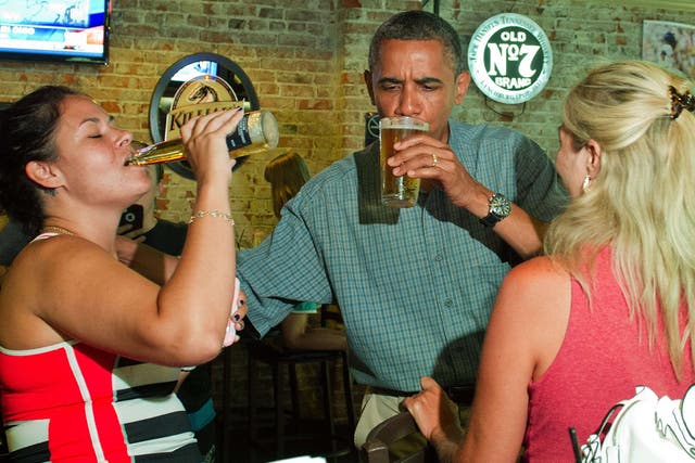 President Barack Obama enjoys a beer with potential voters in the
must-win state of Ohio