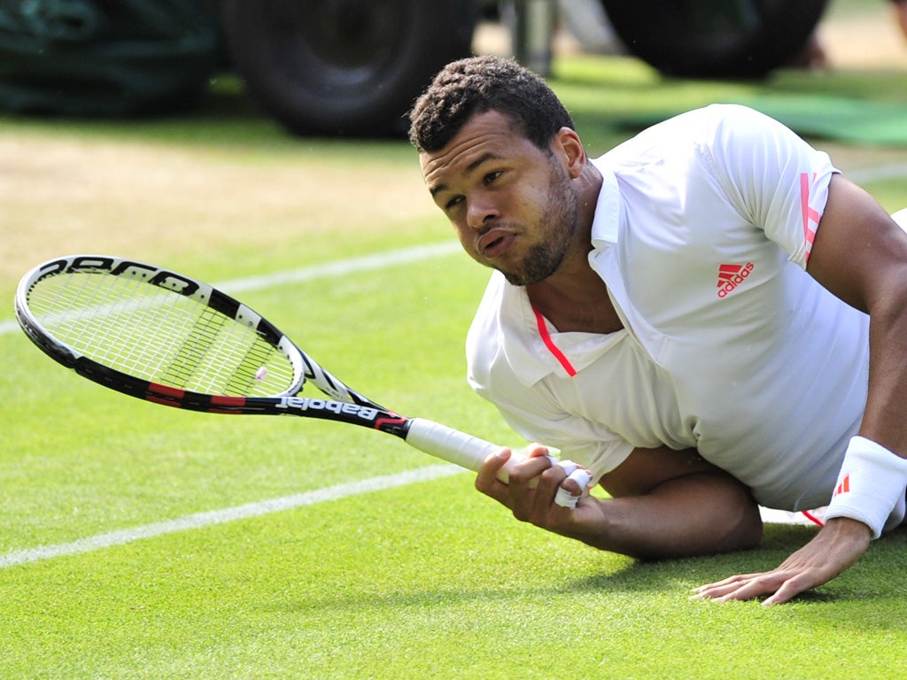 Jo-Wilfried Tsonga: The sporting Frenchman was the first to
congratulate Murray