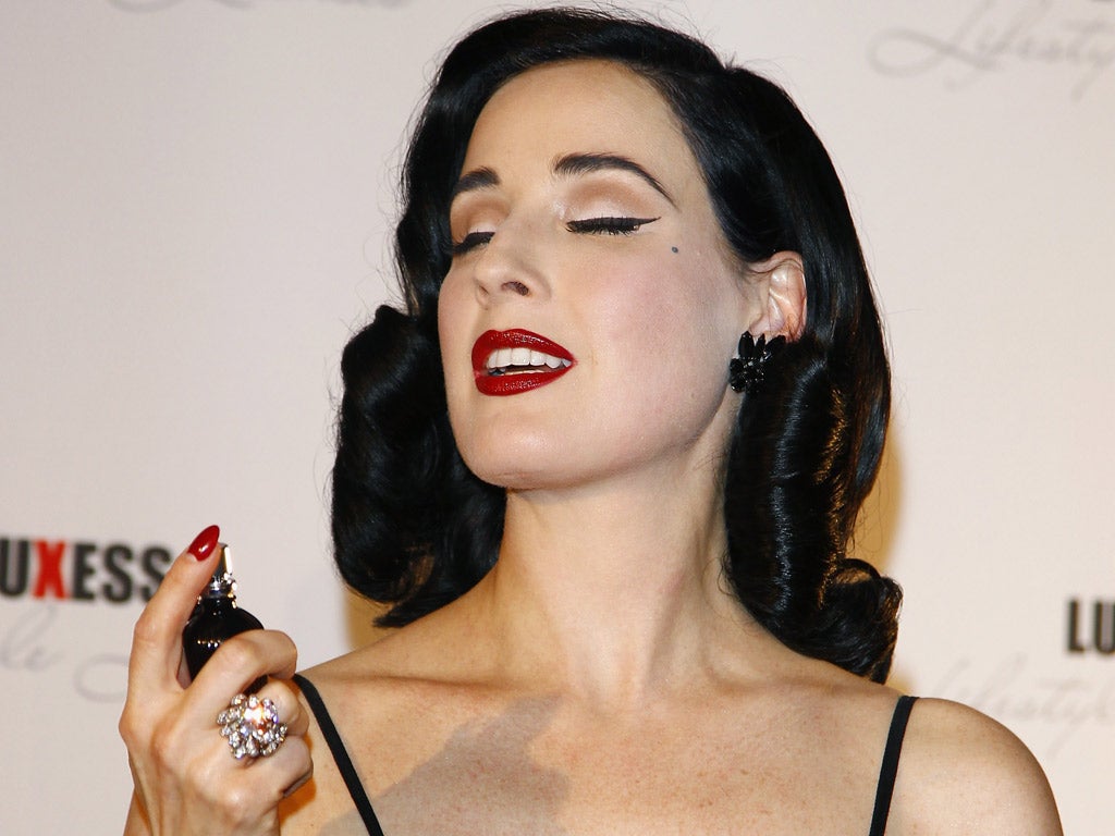Wearing her new perfume, Dita Von Teese would be unwelcome in many US buildings