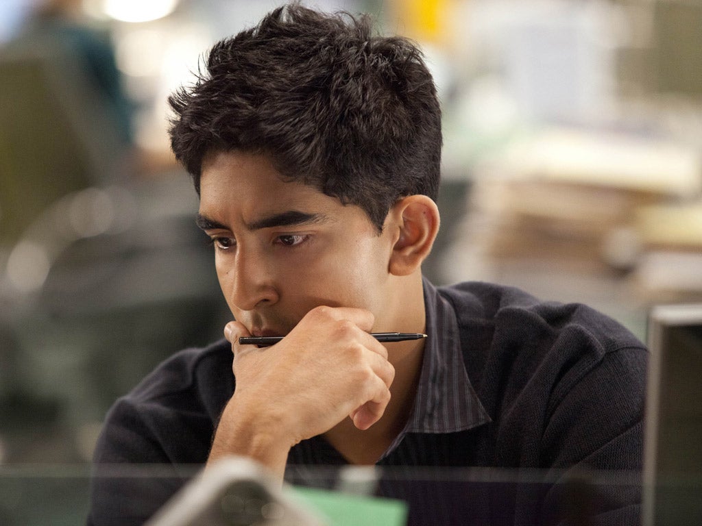 Lucky guy: Dev Patel, on the set of The Newsroom, is grateful he is not struggling to find work like his sister