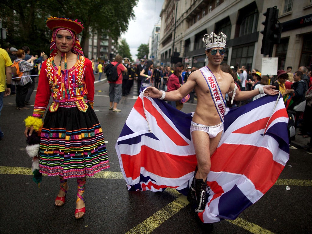 Crowning glory: All dressed up with somewhere to go at Pride London yesterday