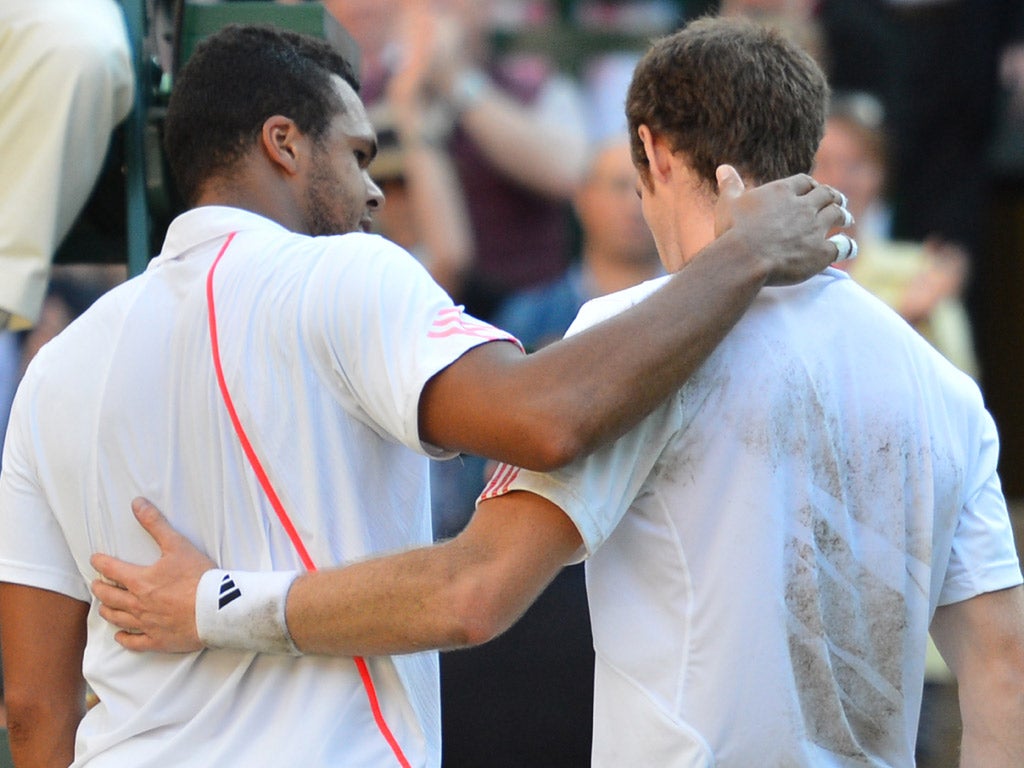 Visibly emotional, Murray shared an embrace with his opponent following his impressive victory