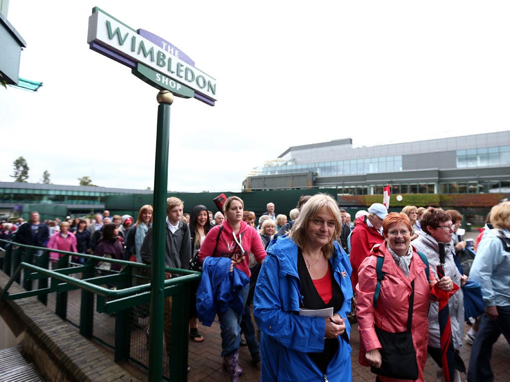 A general view of the crowds entering the site at Wimbledon