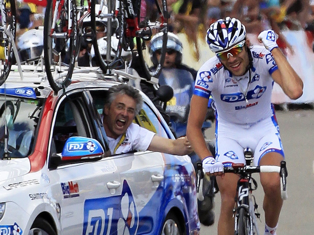 France's Thibaut Pinot punches the air after winning yesterday's stage