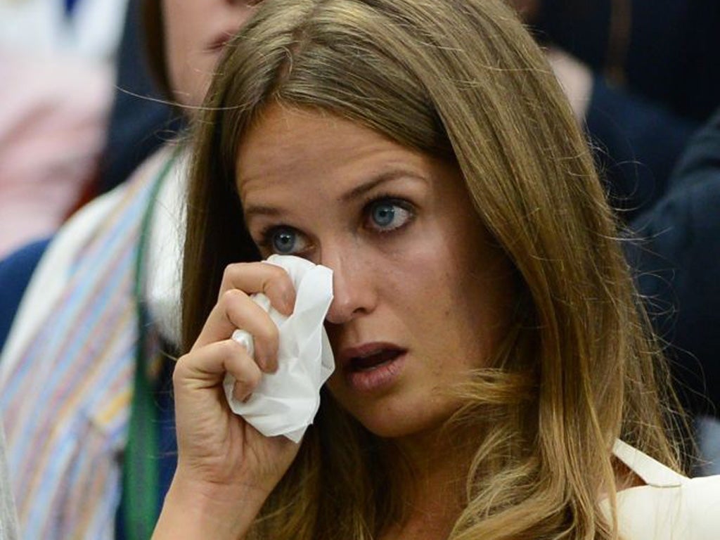 Kim Sears wipes away a tear. Whether Cliff's jacket was the source of her sadness has not been confirmed