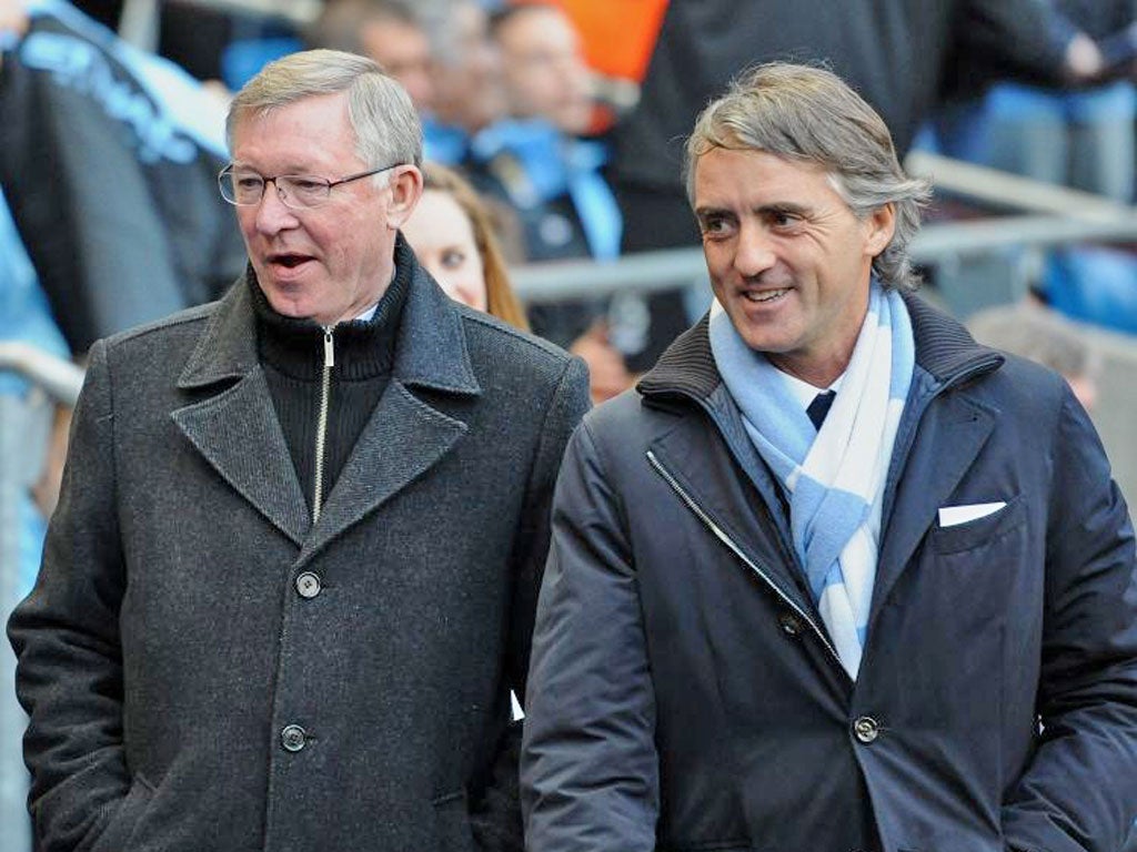 Sir Alex Ferguson (left): £4m per year, Roberto Mancini: £7.5m per year