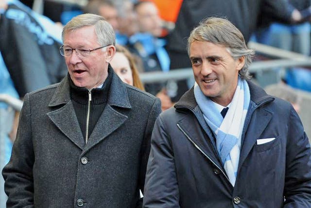 Sir Alex Ferguson (left): £4m per year, Roberto Mancini: £7.5m per year