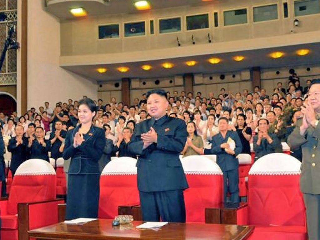 The world wonders who was the elegant young woman bowing beside Kim Jong-un during the ceremony marking his grandfather's 18th death anniversary