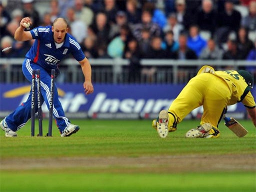 Australia's James Forrest is run out by James Tredwell at Old Trafford