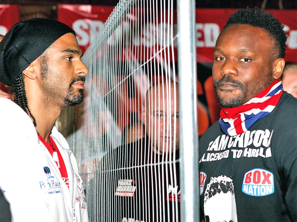 A fence separates David Haye and Dereck Chisora at yesterday's press conference