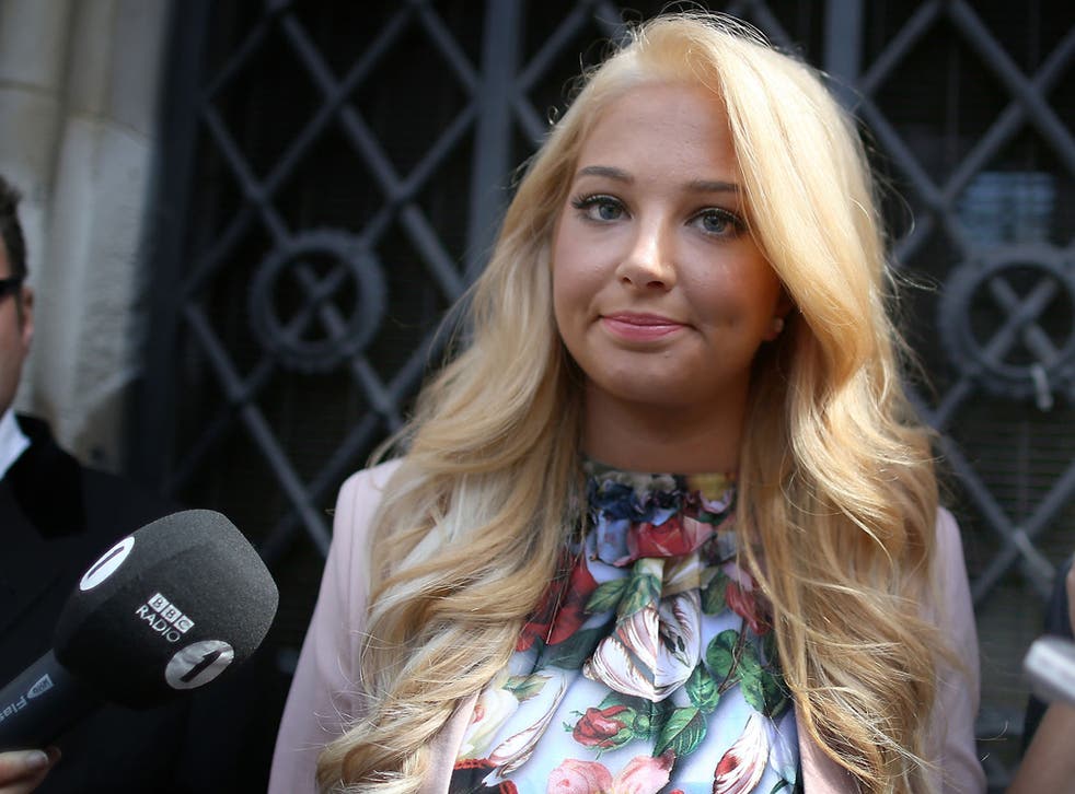 Tulisa speaking to reporters outside the High Court today