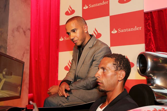 Rio Ferdinand pictured with Lewis Hamilton, enjoying some time off