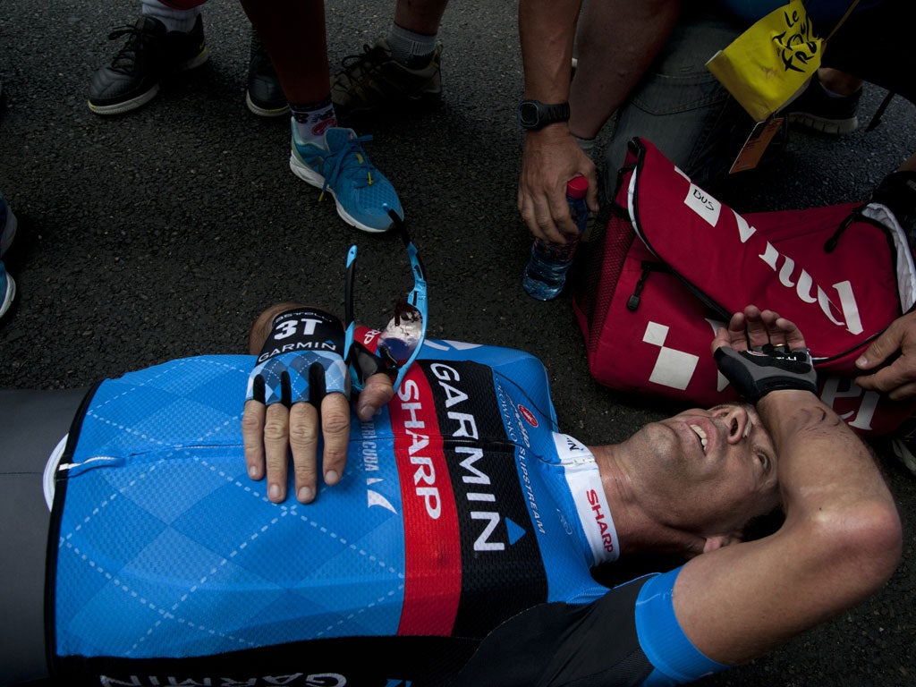 Great Britain's David Millar reacts after crossing the finish line at the end of the 226 km and twelfth stage of the 2012 Tour de France