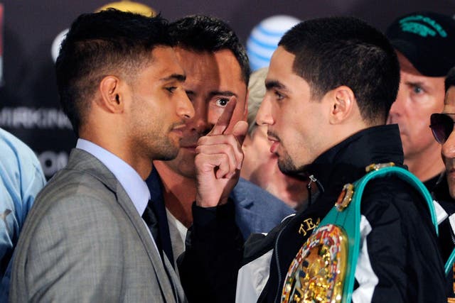 Amir Khan will attempt to take Danny Garcia's WBC light-welterweight belt in Las Vegas tonight
