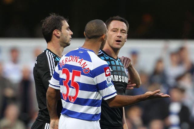 Anton Ferdinand and John Terry argue during the match