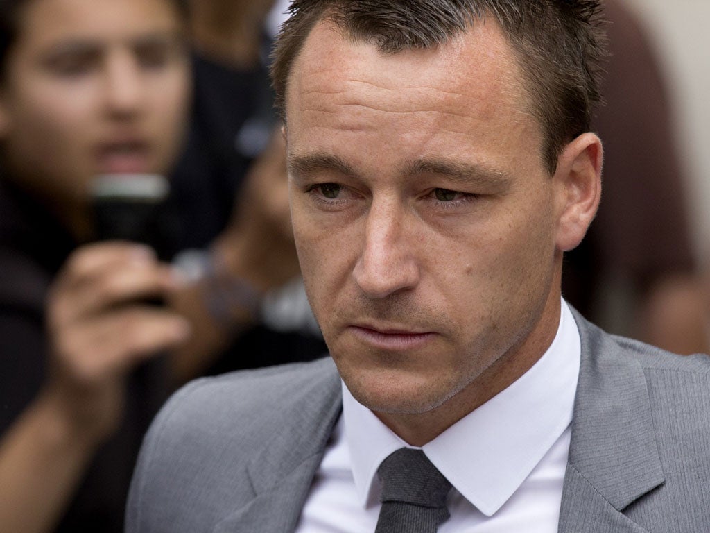Chelsea captain John Terry leaves court after the verdict yesterday