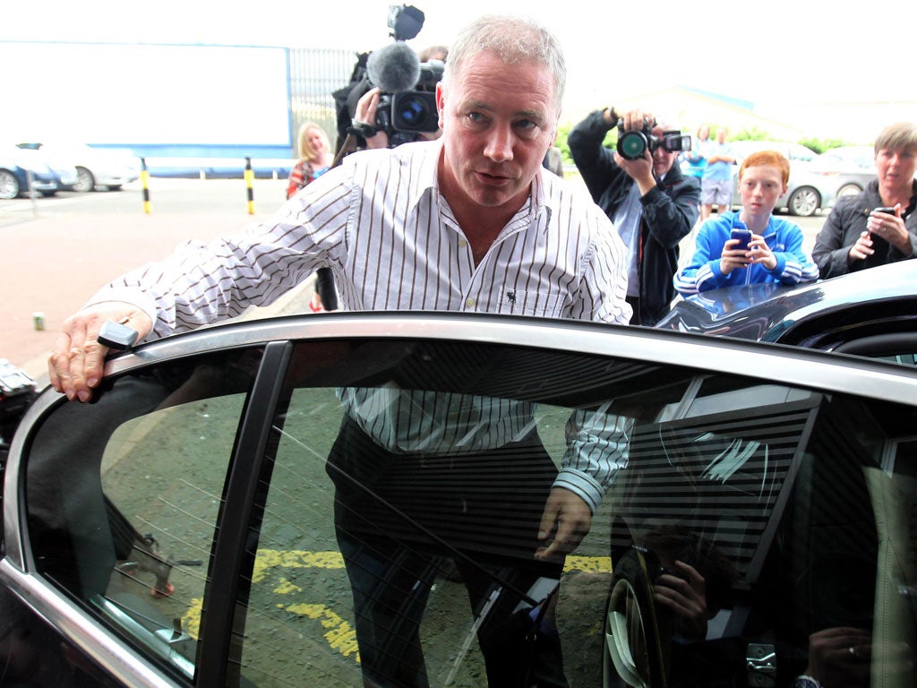 Rangers manager Ally McCoist leaves Ibrox yesterday