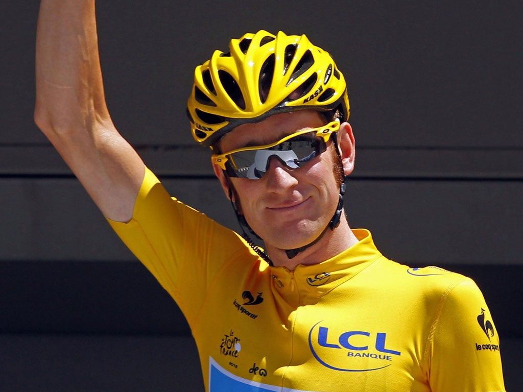 Mellow yellow: Bradley Wiggins enjoys another day in the lead
