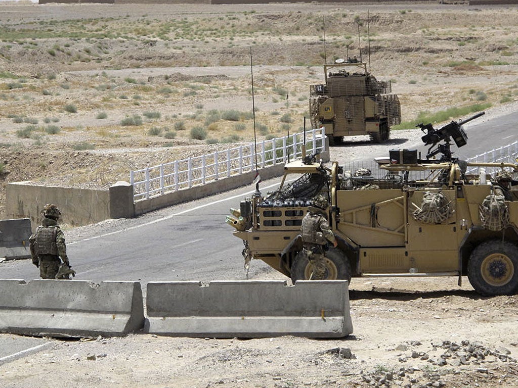 Deployment: British troops at a checkpoint in Afghanistan