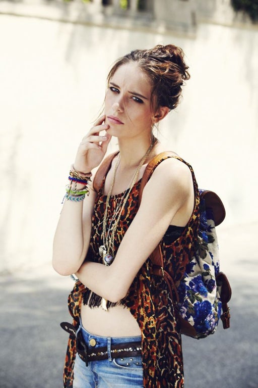 Jean Dreamer: Fringed top  £18, and bracelets (worn throughout) £14 per set, all Urban Outfitters, urbanoutfitters.co.uk; leopard print top £60, MinkPink, minkpink.com; shorts £39.99, Zara, zara.com; leather belt £60, Replay, replay.it; backpack (worn throughout) £45, Aldo, aldoshoes.com; globe necklace £6, Asos, asos.com; necklace, stylist’s own