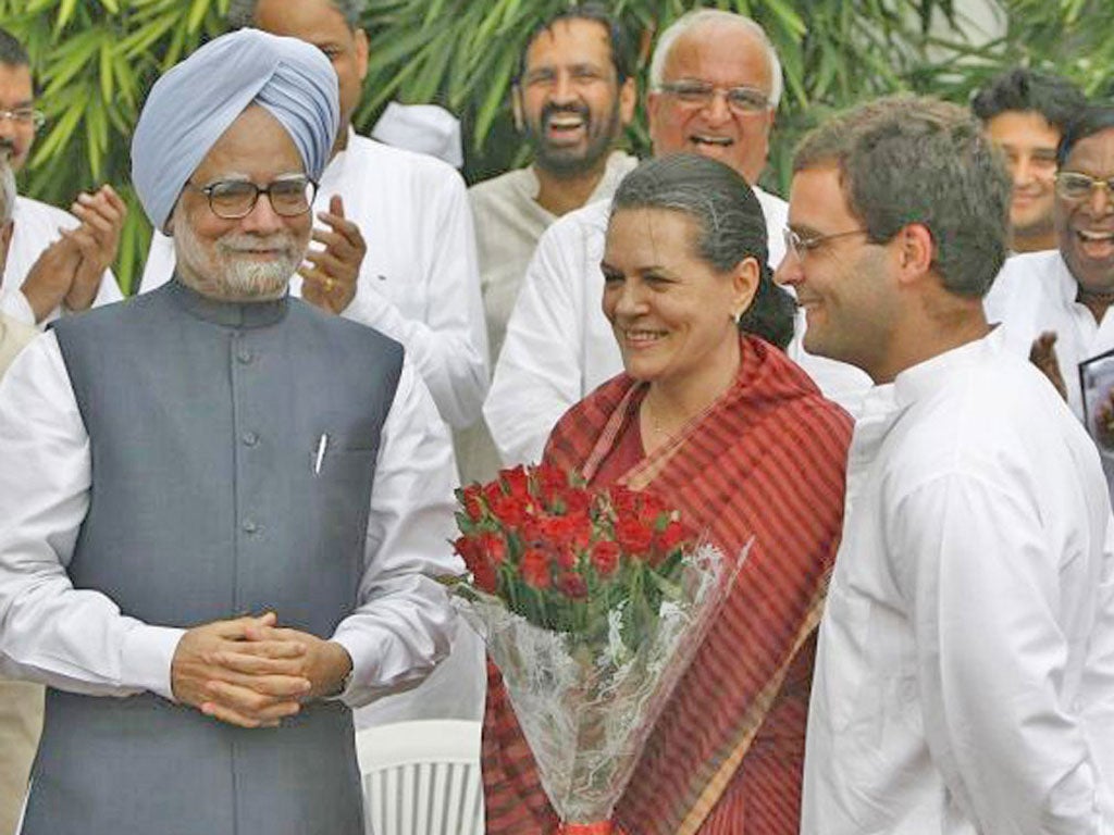 Manmohan Singh with Sonia Gandhi and her son Rahul, right, who is seen as PM-in-waiting