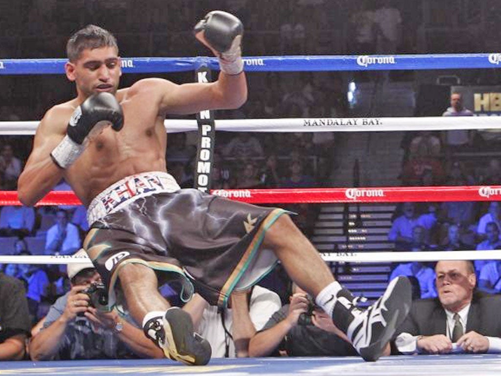 Amir Khan is out for the count