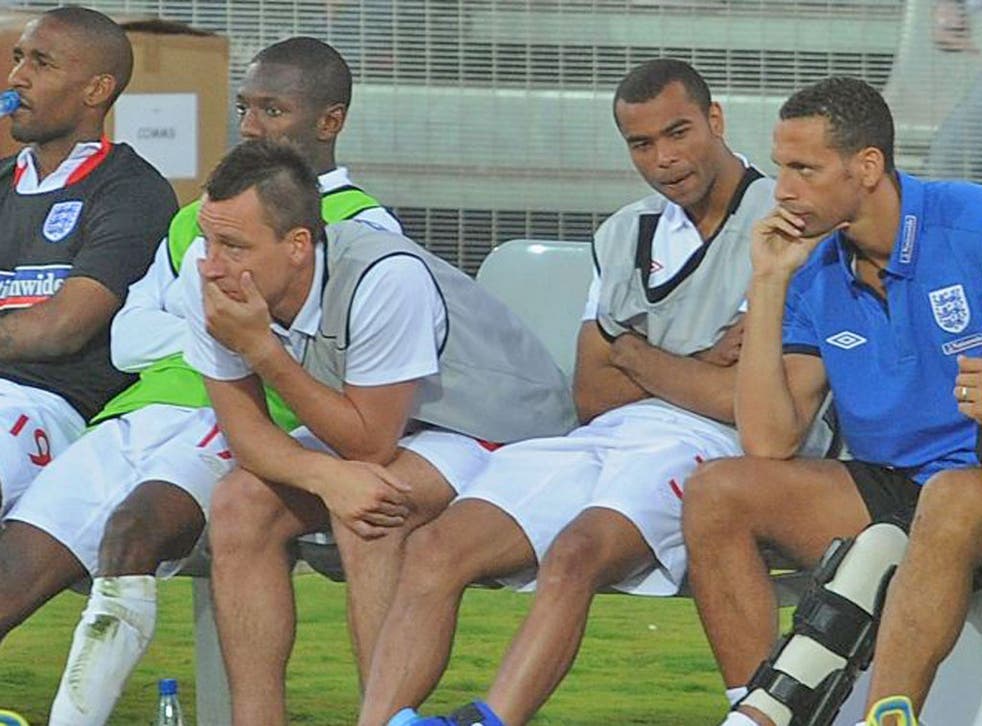 The key players in the racism row, John Terry, Ashley Cole and Rio
Ferdinand sit on the bench for England at the 2010 World Cup